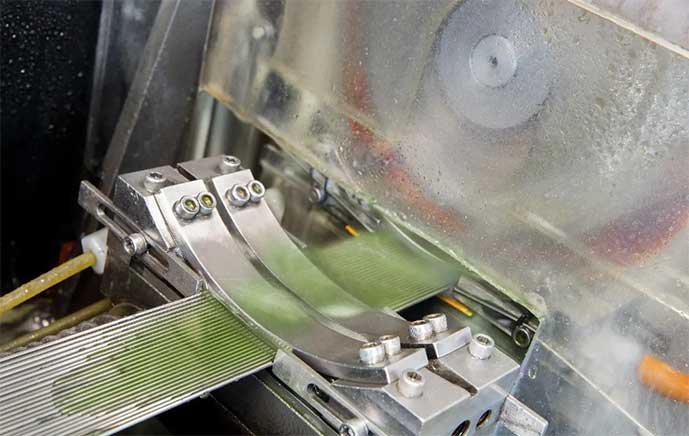Precision cut miniature tubing machine